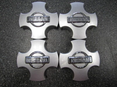 Комплект (4)* оригинальных 16-дюймовых серебристых центральных колпаков для Nissan Altima 2000-2001 годов выпуска 40343-0Z900 62382 - Изображение 1 из 4