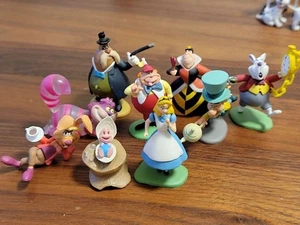 Alice im Wunderland Mini Figuren 9er Set Schoko Ei Disney Vintage Tomy gebraucht - Bild 1 von 1