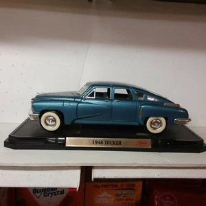 1948 TUCKER TORPEDO 1/18 Diecast Car by Road Signature Blue on display - Picture 1 of 10