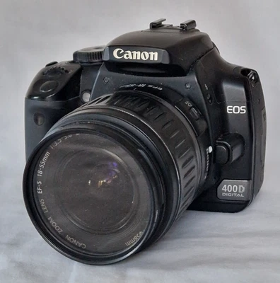 Canon EOS 400D Digital SLR 18-55mm Starter Kit + battery charger, filter, strap - Image 1 of 4