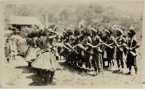Real Photo Postcard RPPC~AFRICA~Men With Drums Facing Women In Grass Skirts - Imagen 1 de 3