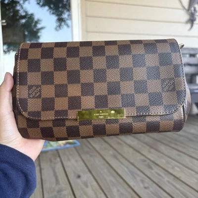 Auténtico bolso bandolera de hombro con bolsa antipolvo Louis Vuitton favorito PM Damier  Foto 1 de 4