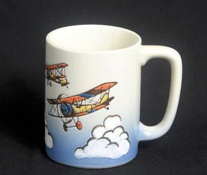 Otagiri Ceramic Beige Coffee Mug Blue Orange Yellow Bi-Plane Clouds - Picture 1 of 6