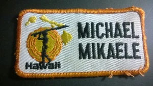 EMBLEMA PARCHE TURÍSTICO VIAJE HAWAIANO "MICHAEL MIKAELE"  - Imagen 1 de 4