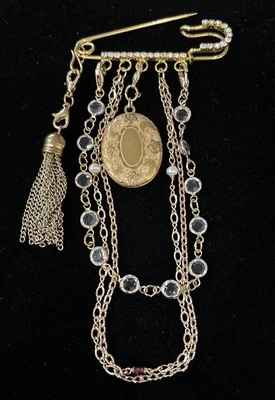 Prendedor/broche de diseño tono dorado  Foto 1 de 4