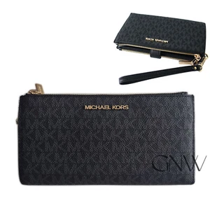 Cartera/muñequera Michael Kors Jet Set de viaje grande con doble cremallera, negra costaba 225 £ - Imagen 1 de 9