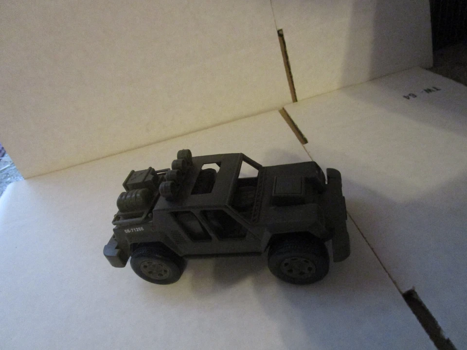 New-Ray brand military jeep (brown) toy   - Image 1 of 1
