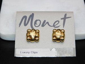 Vintage Monet Gold Tone Diamond Shaped X Clip Earrings on Card