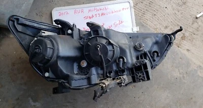 Luz de faro MITSUBISHI RVR 2012 lado izquierdo del conductor usada OEM Foto 1 de 3