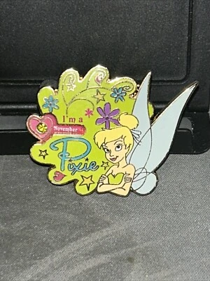 Prendedor giratorio piedra de nacimiento de Peter Pan Campanilla comercial de Disney de colección WDW verde Foto 1 de 3