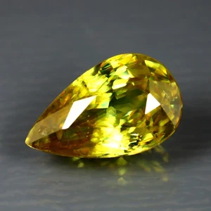 2.29 ct Great looking Pear(10.84 x 6.63 mm)Pakistan Multi Color Sphene Gemstone - Picture 1 of 3