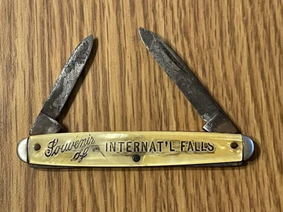 Faca de bolso vintage Souvenir of International Falls Minn falsa madrepérola - Imagem 1 de 4
