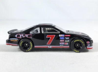 1996 Racing Champions Nascar #7 Geoff Bodine QVC Thunderbird 1:64 - Image 1 of 4