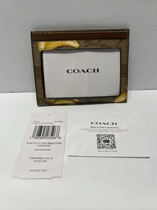 Coach’s SLM ID CC SG BNN PRN CR842 SV/Khaki/Dark Saddle SVNM9 JAX11005863 - Picture 1 of 5