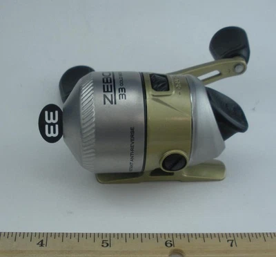 Carrete microfundido dorado Zebco 2138873 33MCNGOLDBX 33 con 4 lb. Línea de prueba Foto 1 de 4