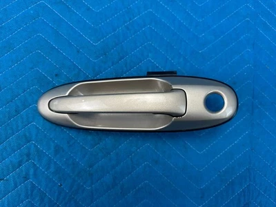 Manija exterior de la puerta delantera del conductor Lexus LX470 dorada: 4M9 1998-2002 OEM Foto 1 de 4