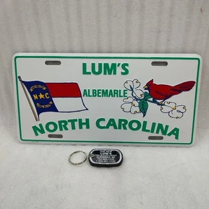 Targa booster vintage LUM'S Ford Lincoln Mercury Albemarle NC con portachiavi  - Foto 1 di 4