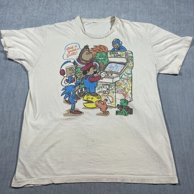 Camiseta Threadless Guys "This Games Sucks" Hombre Mediana Beige Retro Juegos Estampado Foto 1 de 4