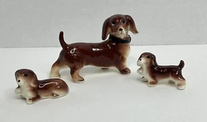 Vintage Relco Miniatur Dackel Familie mit 3 handbemalten Figuren Japan - Bild 1 von 24