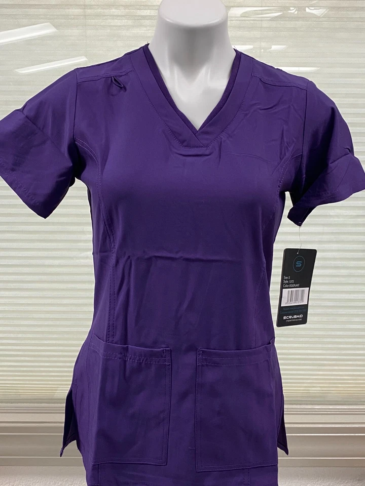 Juegos exfoliantes elásticos de 4 vías SCRUBAID, S-2XL, varios colores, precio de venta sugerido por el fabricante 78,00 USD Foto 1 de 1