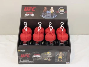 Vetrina UFC Octagon Fighters e 8 figure SIGILLATE Blind Pack MMA Fighting 2025 - Foto 1 di 15