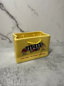 M&M’s World Sacchetto Ceramica Giallo Fioriera Piatto Caramelle New York Las Vegas Orlando - Foto 1 di 6