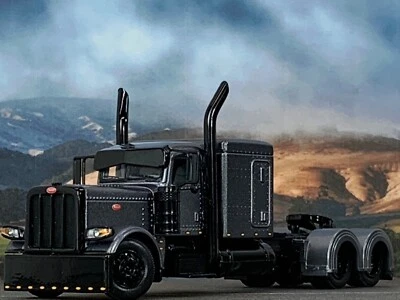1/64 DCP GUN METAL GRAY PETERBILT 389 W/ 63" FLAT TOP SLEEPER - Image 1 of 4