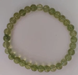 PERIDOT OLIVE NATURAL GEMSTONE-CRYSTAL 6 MM BEAD STRETCH BRACELET-FREE POSTAGE - Picture 1 of 4