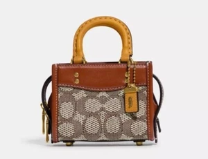 NWT Coach Rogue 12 In Signature Textile Jacquard Crossbody Cocoa Burnished Amber - Picture 1 of 7