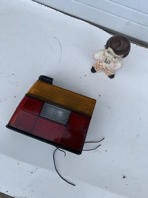 OEM 1984 1985 1986 1987 88 VOLKSWAGEN JETTA CONDUCTOR LUZ TRASERA IZQUIERDA 165945112 Foto 1 de 4