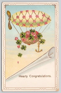 Cartolina in rilievo rosa trifoglio Zeppelin dirigibile cordiali congratulazioni - Foto 1 di 3
