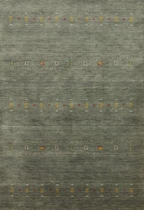 Elegante alfombra hecha a mano de lana verde Gabbeh 5x7 con distintos diseños tribales - Imagen 1 de 11