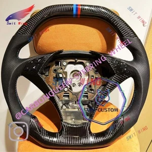 03-06 BMW E60/E61 CARBON FIBER STEERING WHEEL (W/diamond shaped metal key) - Picture 1 of 10