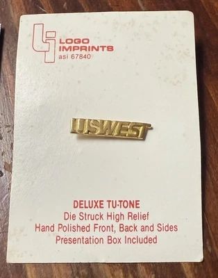 A114 Vintage USWest Communications Bell Logo Lapel Pin Gold Tone NOS - Image 1 of 4