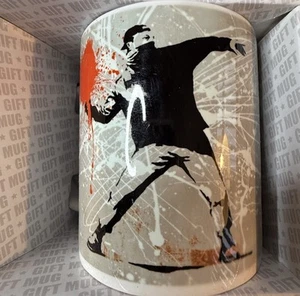 Banksy MUG Throwing Heart Coffee Tea genius or vandal  Ceramic NEW In Box - Picture 1 of 8