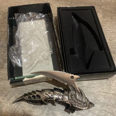 Cuchillo de dedo flexible con garra de dragón para cubiertos de hierro Whetstone Foto 1 de 4