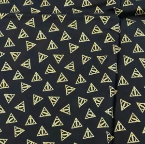 HARRY POTTER Deathly Hallow Logo Cotton Fabric by Camelot, Black Gold, 2.5 Yards - Picture 1 of 3