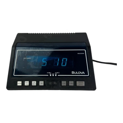 BULOVA DIGITAL ALARM CLOCK VINTAGE 1980's DUAL ALARM/DATE RARE. FUTURISTIC Cover