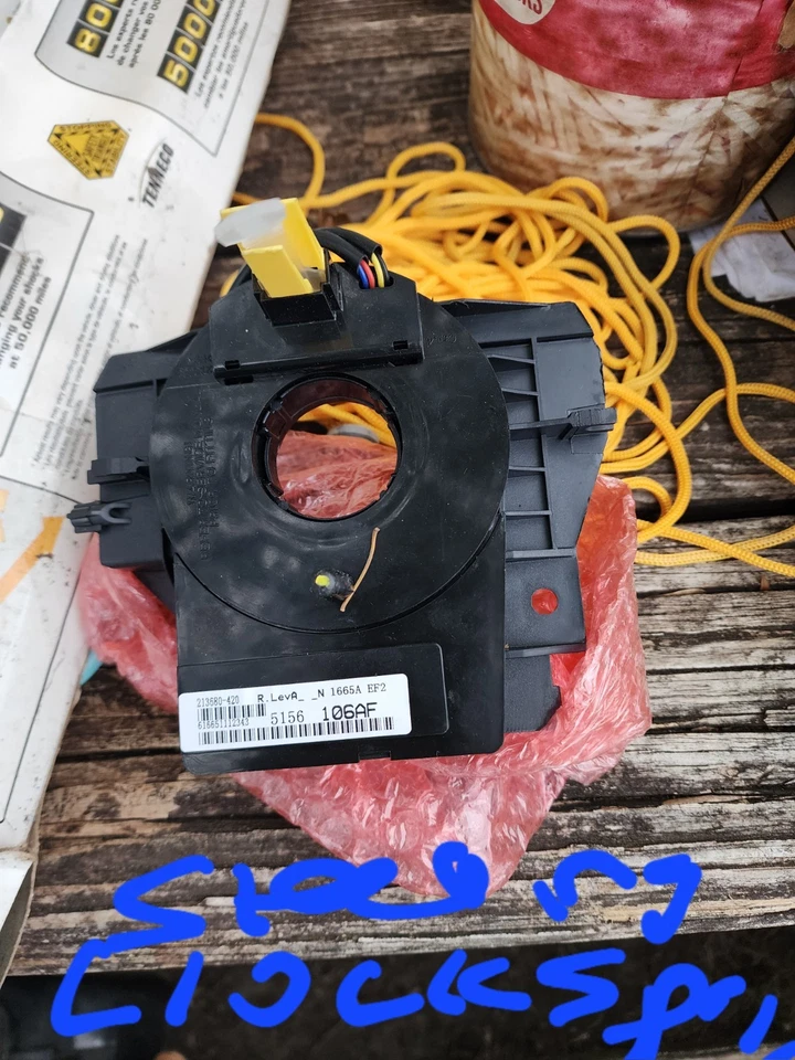 volante reloj resorte conocido como cable espiral o airbag interruptor giratorio). Foto 1 de 2