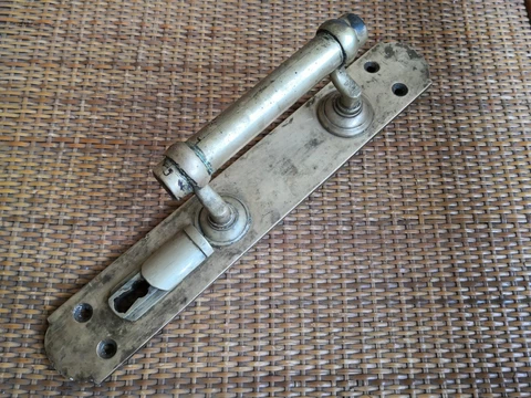 Door knob. Vintage door handle made in the second half of the 19th century Cover