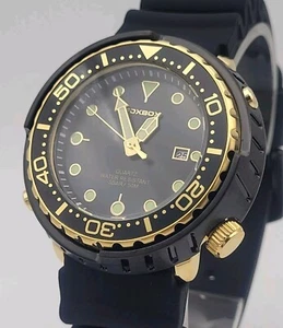 Reloj de buceo para hombre 45,5 mm cuarzo negro y dorado correa de silicona 50 m WR - Imagen 1 de 13