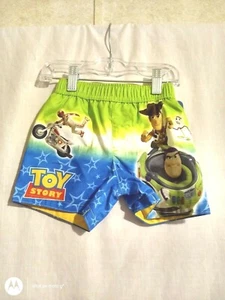 12 month Pixar Toy Story boy green swim trunk - Picture 1 of 3