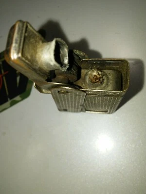 Encendedor único Regens EE. UU. Mfg tipo apretón años 40 raro usado número de patente mkd. Foto 1 de 4