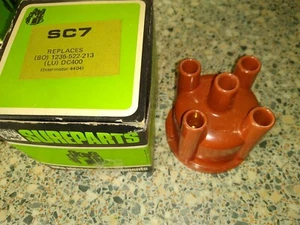 TAPA DE DISTRIBUIDOR - AUDI 80 & VOLKSWAGEN GOLF PASSAT SCIROCCO BMW 315 & 316 & 518 - Imagen 1 de 4