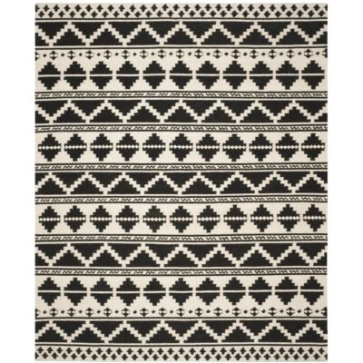 SAFAVIEH Dhurries DHU110A Handwoven Black / Ivory Rug - Image 1 of 4