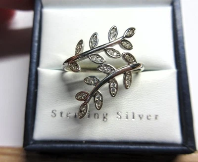 ANILLO ENVOLVENTE PLATA ESTERLINA Y TOPACIO Diseño Hoja Foto 1 de 4