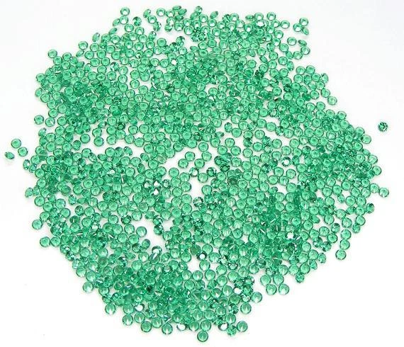 50 PCS. ROUND 1.6 MM. MACHINE CUT LAB CREATED NANOCRYSTAL EMERALD - Image 1 of 1