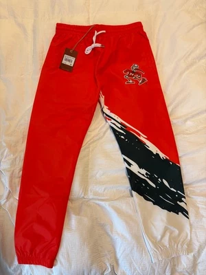 Pantalón de calentamiento con pincel Mitchell & Ness para hombre de la Universidad de Miami, talla S, nuevo con etiquetas Foto 1 de 4