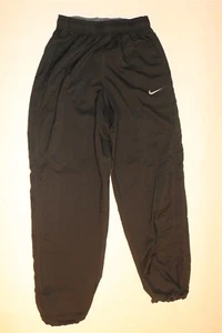 NIKE DRI-FIT - Pantalones deportivos para mujer con aberturas de pierna con cordón NEGRO PEQUEÑO - Imagen 1 de 2