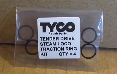 JUEGO DE 4 NEUMÁTICOS DE TRACCIÓN NEGROS PARA TYCO TENDER DRIVE STEAM LOCO HECHOS EN HONG KONG Foto 1 de 2